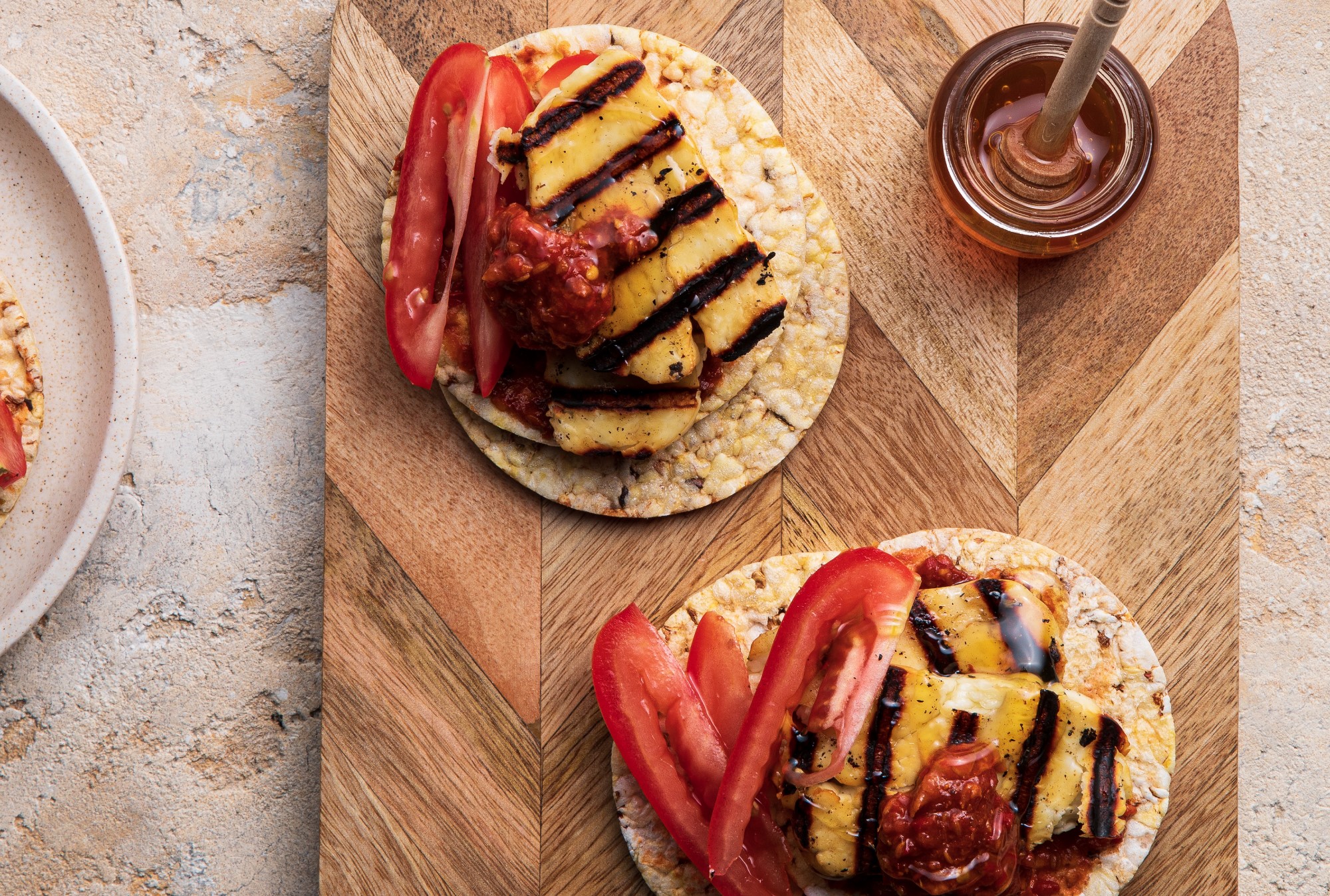 Rose Harissa, Haloumi, Honey & Tomato on Corn Thins slices