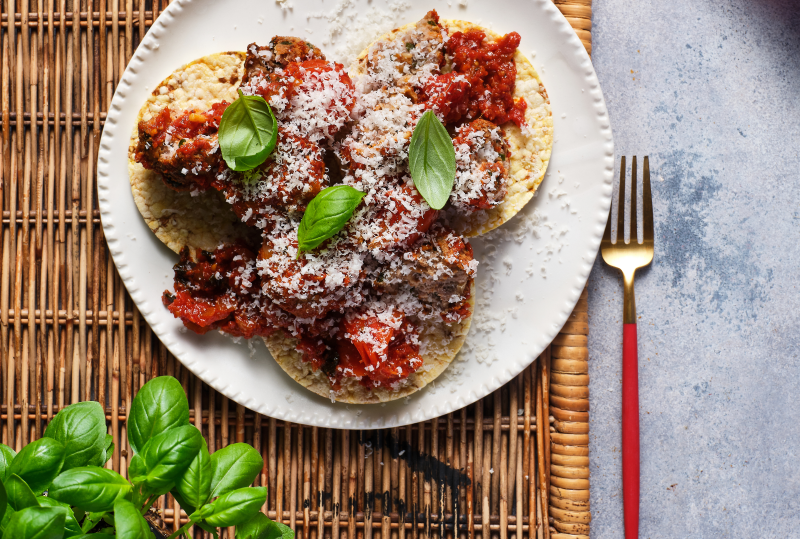 Meatballs & tomato sauce on Corn Thins slices