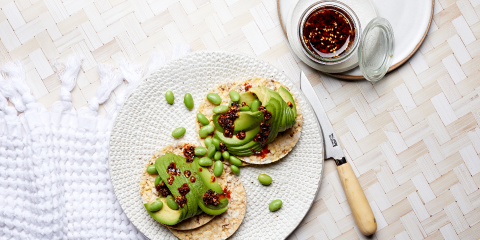 Avocado, edamame & Chilli oil on Corn Thins slices
