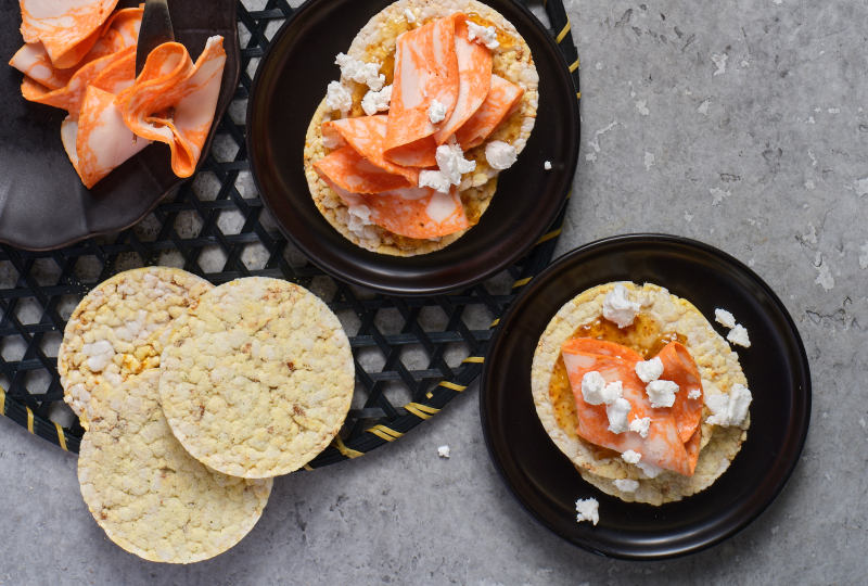 Fig Jam, Buffalo Chicken & Goats Cheese on Corn Thins slices