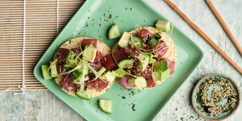 Poke with tuna, avocado, spring onion & furikake on Corn Thins slices